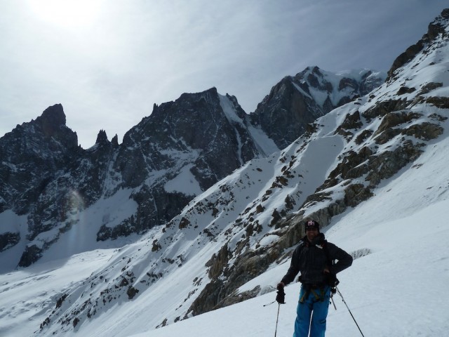 Christophe on the Brenva Glacier, Arete de Peuterey behind